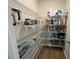 Organized pantry with wire shelving, offering ample storage for food and kitchen appliances at 187 S Reindeer Rd., Surfside Beach, SC 29575