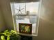 Bright view of a peaceful waterway featuring artwork, a houseplant, and sunshine at 187 S Reindeer Rd., Surfside Beach, SC 29575