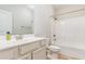 Well-lit bathroom features a shower-tub combo, toilet, and vanity with ample storage space at 189 Ella Kinley Circle # 203, Myrtle Beach, SC 29588