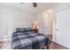 Bedroom boasts neutral walls, modern lighting and access to a doorway at 189 Ella Kinley Circle # 203, Myrtle Beach, SC 29588