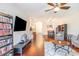 Inviting living room with hardwood floors, an entertainment center, and comfortable seating at 189 Ella Kinley Circle # 203, Myrtle Beach, SC 29588
