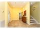 Open foyer with tile flooring, staircase access, and lots of natural light at 1965 24Th Ave. N, North Myrtle Beach, SC 29582
