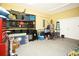 Spacious garage interior with shelving for ample storage, and double doors at 1965 24Th Ave. N, North Myrtle Beach, SC 29582