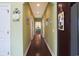 Hallway with wood floors and doors leading to other rooms at 1965 24Th Ave. N, North Myrtle Beach, SC 29582