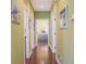 Hallway with wood floors and doors leading to other rooms at 1965 24Th Ave. N, North Myrtle Beach, SC 29582