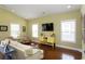 Bright living room with hardwood floors, comfortable seating and lots of natural light at 1965 24Th Ave. N, North Myrtle Beach, SC 29582