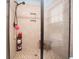 Tiled shower with bench, built-in shelving, and a glass enclosure for a modern and functional design at 1965 24Th Ave. N, North Myrtle Beach, SC 29582