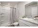 Clean bathroom featuring a shower and vanity with modern fixtures and neutral finishes at 204 Jeff Waters Circle, Longs, SC 29568