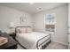 Comfortable bedroom with natural light and calming tones at 204 Jeff Waters Circle, Longs, SC 29568