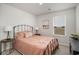 Cozy bedroom with warm tones, comfortable decor, and plenty of natural light at 204 Jeff Waters Circle, Longs, SC 29568