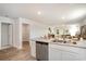 Open kitchen featuring stainless steel appliances and view to the dining and living area at 204 Jeff Waters Circle, Longs, SC 29568