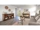 Cozy living room with neutral tones, stylish decor, and abundant natural light at 204 Jeff Waters Circle, Longs, SC 29568