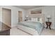 Comfortable main bedroom showcasing a plush bed, serene color palette, and en-suite bathroom at 204 Jeff Waters Circle, Longs, SC 29568