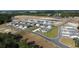 An aerial view of a new community that features green spaces and modern home designs at 207 Calm Dr., Little River, SC 29566