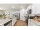 Modern kitchen featuring stainless steel appliances, granite countertops, and ample cabinet space at 207 Calm Dr., Little River, SC 29566
