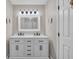Bathroom featuring a double vanity with modern fixtures, clean lines, and a neutral color palette at 211 76Th Ave. N # A-2, Myrtle Beach, SC 29572