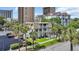 Charming two-story condo with a landscaped yard and white picket fence is ideally located near the beach at 211 76Th Ave. N # A-2, Myrtle Beach, SC 29572