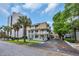 Street view of the condo community and parking lot at 211 76Th Ave. N # A-2, Myrtle Beach, SC 29572