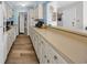 Kitchenette featuring ample cabinet space, updated appliances and a convenient breakfast bar at 211 76Th Ave. N # A-2, Myrtle Beach, SC 29572
