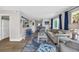 Cozy living room with open layout, comfortable seating and accent rug at 211 76Th Ave. N # A-2, Myrtle Beach, SC 29572