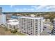 Wide aerial shot of the condo building featuring many balconies and an ocean view at 2507 S Ocean Blvd. # 802, North Myrtle Beach, SC 29582