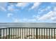 Wide ocean view from the balcony, with beach visible below and blue sky with clouds above at 2507 S Ocean Blvd. # 802, North Myrtle Beach, SC 29582