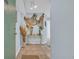 Light blue entryway with beach decor and tile flooring at 2507 S Ocean Blvd. # 802, North Myrtle Beach, SC 29582