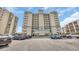 Condo building with convenient parking and easy access to nearby amenities at 2507 S Ocean Blvd. # 802, North Myrtle Beach, SC 29582