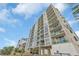 Exterior angle view of the building with multi-story condos and balconies at 2507 S Ocean Blvd. # 802, North Myrtle Beach, SC 29582