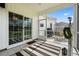 Well-appointed screened-in porch features a dining area and seamless transition to the backyard at 2827 Allen Dew Rd., Conway, SC 29527