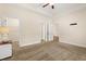 Bedroom featuring neutral walls, plush carpet, and doorways to an ensuite and closet at 2827 Allen Dew Rd., Conway, SC 29527