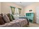 Close-up of bedroom showcasing a twin bed, pillows, and decor at 2827 Allen Dew Rd., Conway, SC 29527
