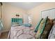 Bedroom showing a twin bed, storage desk and a glimpse of the ensuite at 2827 Allen Dew Rd., Conway, SC 29527