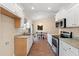 Well-equipped kitchen with sleek appliances and a view into the dining and living areas at 2827 Allen Dew Rd., Conway, SC 29527