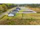 Aerial view of a residential neighborhood with similar style homes and large backyards at 2827 Allen Dew Rd., Conway, SC 29527