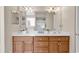 Bright bathroom featuring double sinks, a large mirror, and ample counter space at 3148 Bayhaven Dr., Myrtle Beach, SC 29579