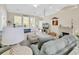Bright living room with vaulted ceilings, neutral colors, cozy seating, and large windows at 3148 Bayhaven Dr., Myrtle Beach, SC 29579