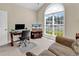 Bright office space with a large arched window allowing for ample natural light at 3148 Bayhaven Dr., Myrtle Beach, SC 29579