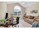 Spacious office with a large window, providing natural light and a cozy seating area at 3148 Bayhaven Dr., Myrtle Beach, SC 29579