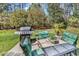 Outdoor patio with a stainless steel grill and seating area, perfect for entertaining at 3148 Bayhaven Dr., Myrtle Beach, SC 29579