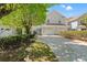 Exterior elevation of the home showing the two-car garage and well-maintained landscaping at 323 14Th Ave. S # B, Surfside Beach, SC 29575