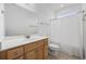 Bathroom featuring single sink, wood cabinet, large mirror, and a shower and tub combo at 3851 Journeys End Rd., Murrells Inlet, SC 29576