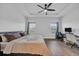 Large bedroom with ample natural light, ceiling fan, and a dedicated workspace at 4105 Da Vinci Dr., Myrtle Beach, SC 29579