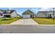 View of this one-story home features an attached garage, concrete driveway, and well-manicured lawn at 4105 Da Vinci Dr., Myrtle Beach, SC 29579