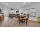 Spacious living space features wood-look flooring, natural light, and cozy dining and living areas at 4105 Da Vinci Dr., Myrtle Beach, SC 29579