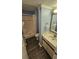 Bright and airy bathroom features a modern sink, vanity and a stand-up shower at 415 Ocean Creek Dr. # 2443, Myrtle Beach, SC 29572