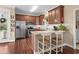 Kitchen with granite countertops, stainless steel appliances, and breakfast bar at 4387 Landing Rd., Little River, SC 29566