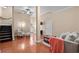 Inviting living room featuring cozy seating, modern decor, and easy access to the staircase at 4387 Landing Rd., Little River, SC 29566