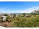 Panoramic view of a neighborhood with beautiful homes, marshland and distant waterfront at 4387 Landing Rd., Little River, SC 29566