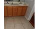 Bathroom featuring double sinks with tiled flooring at 4664 Southgate Pkwy., Myrtle Beach, SC 29579